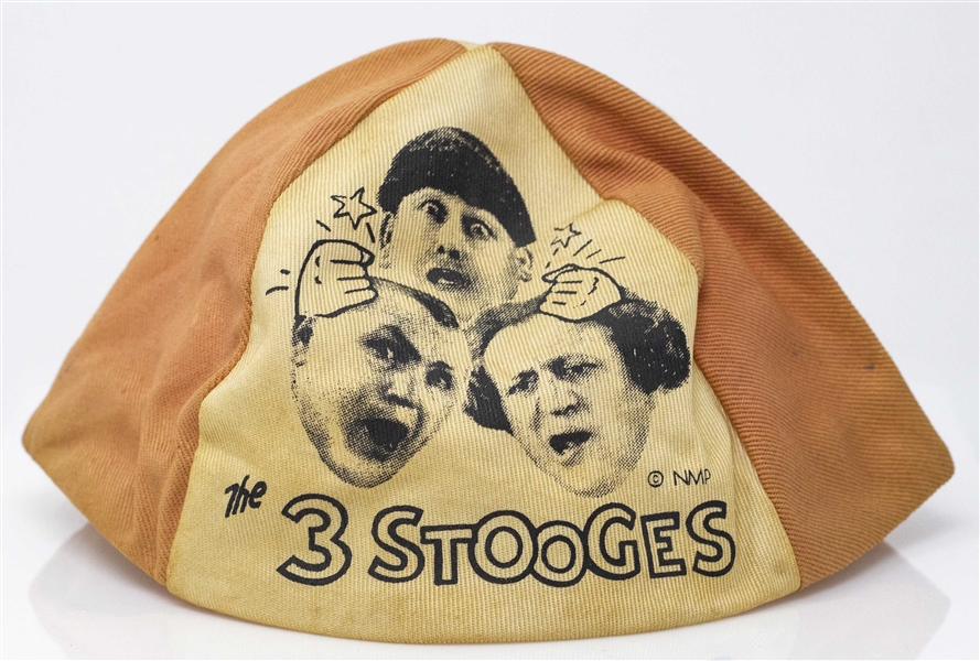 Three Stooges Children's T-Shirt and Beanie -- Beanie Featuring Curly Has Satin Rim, Size Large -- Cotton T-Shirt Is Children's Size 8 -- Discoloration to Both, Else Very Good